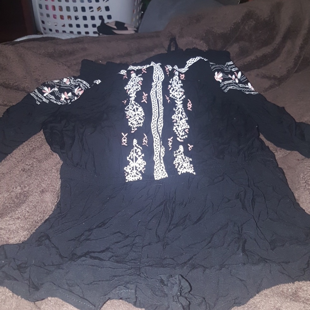 An off the sholder jumper in a size L
